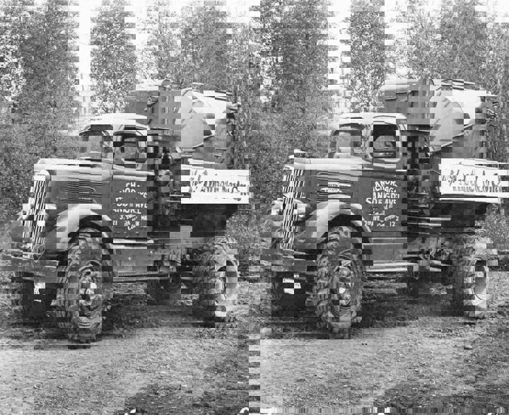 Early ready-mix concrete truck, mid-20th century.